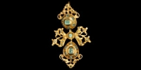 Gold Gross with Baguette Cut Emeralds