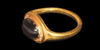 Gold and Cabochon Garnet Ring